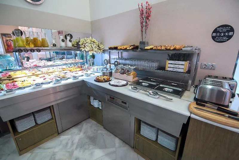 Отель Petit Palace Marques Santa Ana Севилья